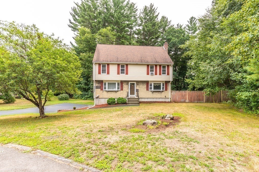 8 Comanche Circle Billerica, MA 01821 - Photo 28 of 35 a view of a house with a swimming pool