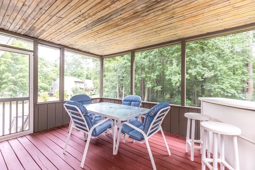 8 Comanche Circle Billerica, MA 01821 - Photo 29 of 35 a view of a dining room with furniture and wooden floor