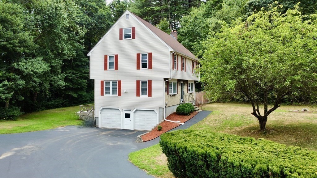 8 Comanche Circle Billerica, MA 01821 - Photo 34 of 35 a view of backyard of a house