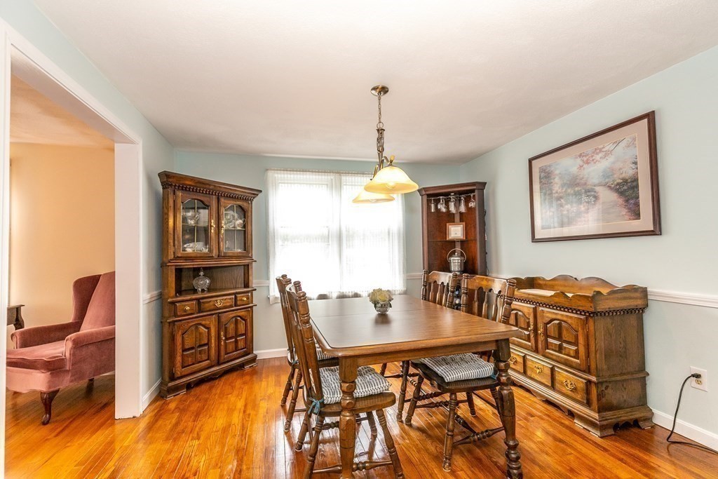 8 Comanche Circle Billerica, MA 01821 - Photo 9 of 35 a dining room with furniture and window