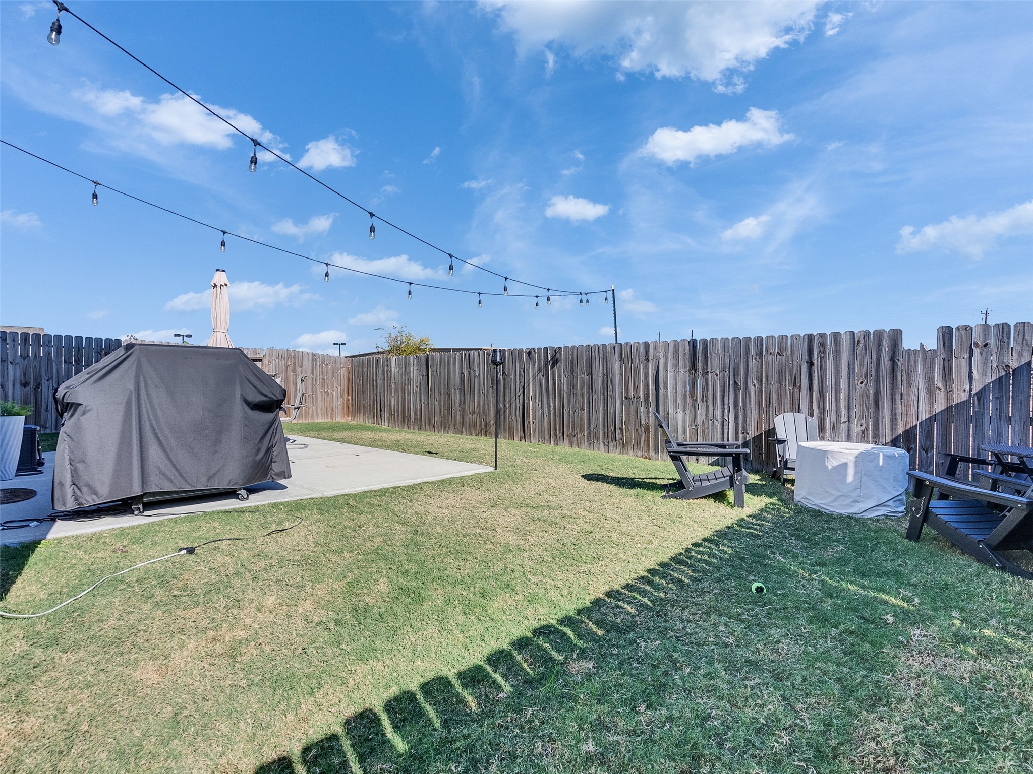 5702 Rucio Lane Houston, TX 77092 - Photo 25 of 30 a view of a backyard with wooden fence