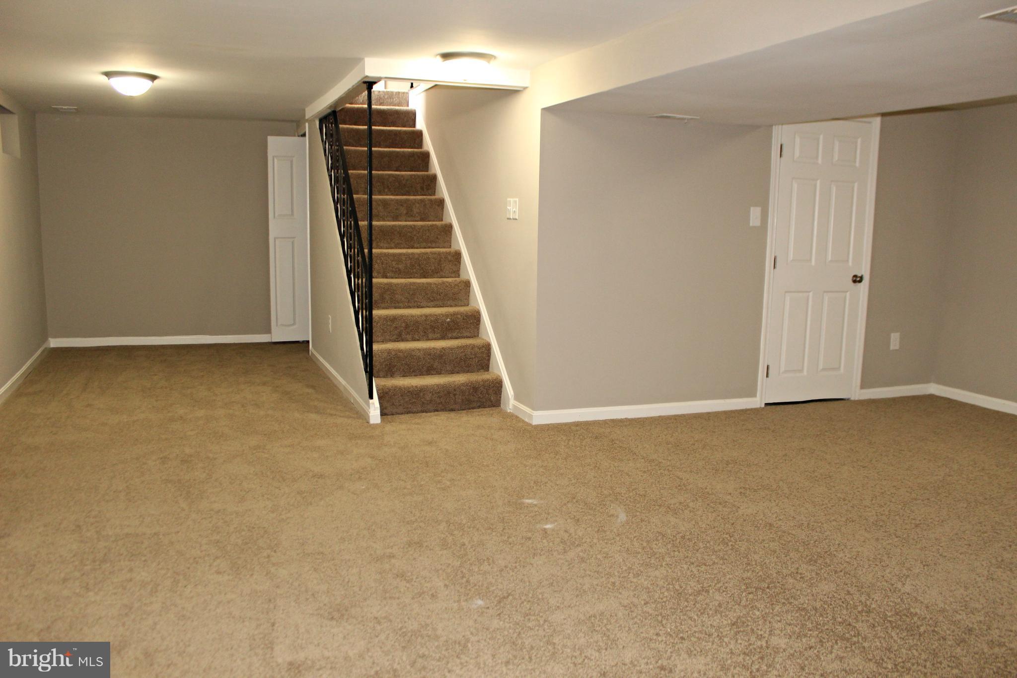 238 Highfalcon Road Reisterstown, MD 21136 - Photo 15 of 21 Large rec. room in finished basement!