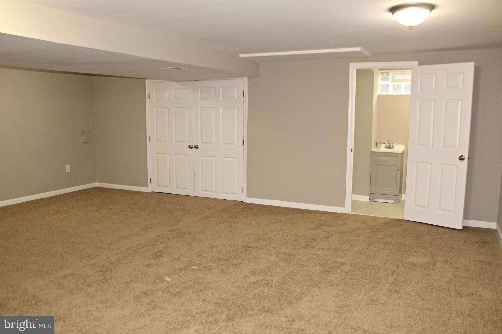 238 Highfalcon Road Reisterstown, MD 21136 - Photo 16 of 21 Large rec. room in finished basement!