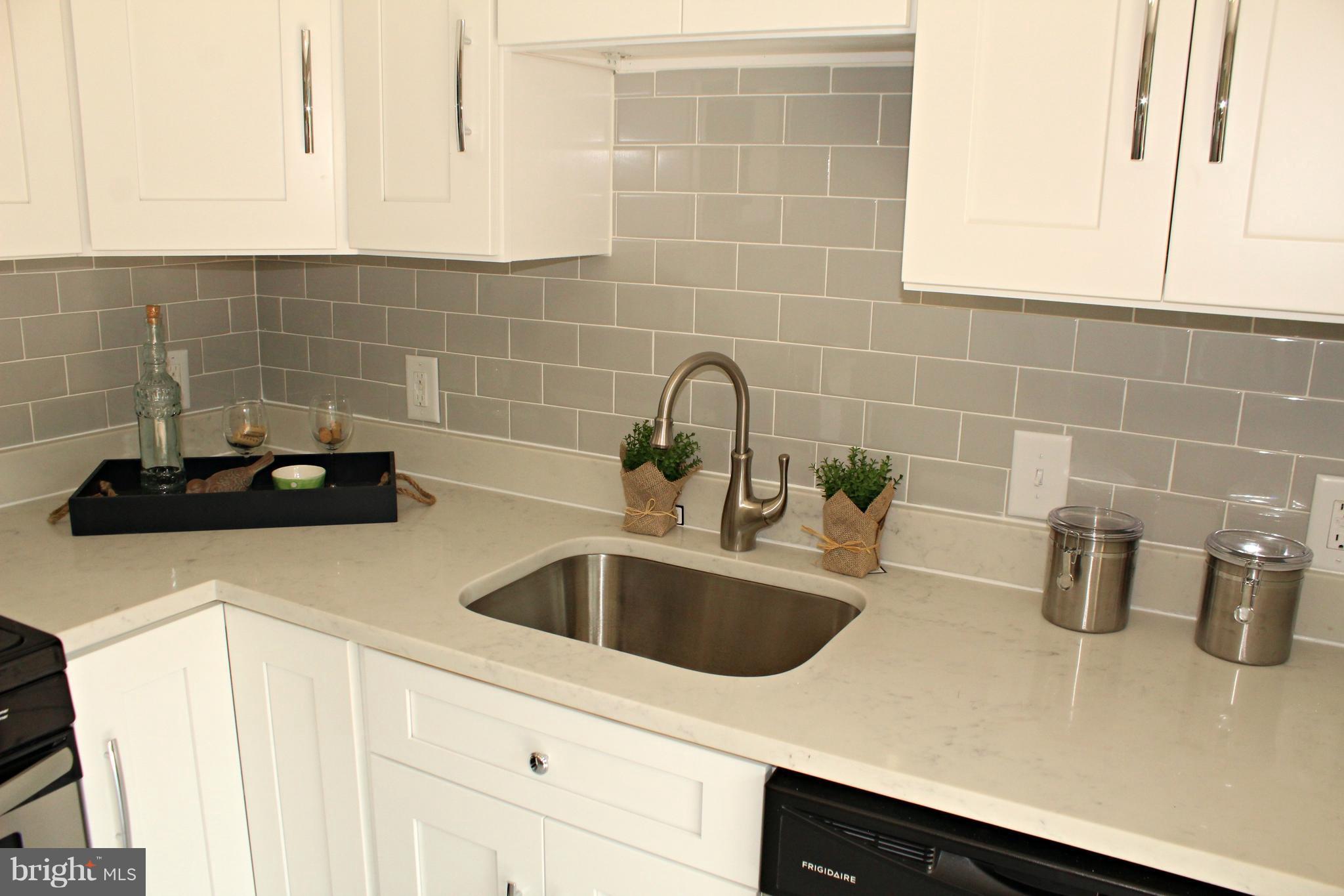 238 Highfalcon Road Reisterstown, MD 21136 - Photo 3 of 21 Quartz counter tops and elegant tile back splash
