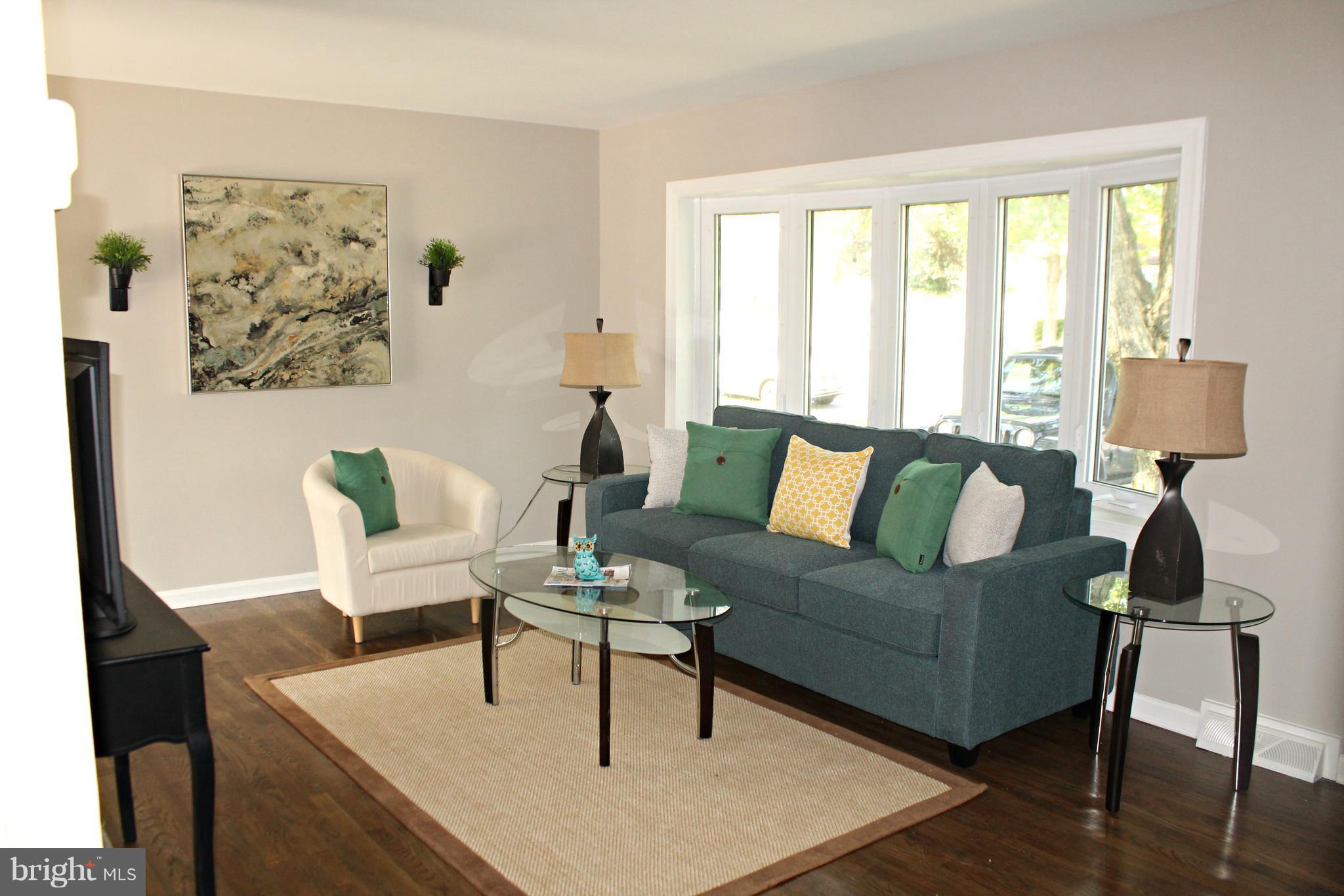 238 Highfalcon Road Reisterstown, MD 21136 - Photo 4 of 21 Sunny living room with hardwood flooring!