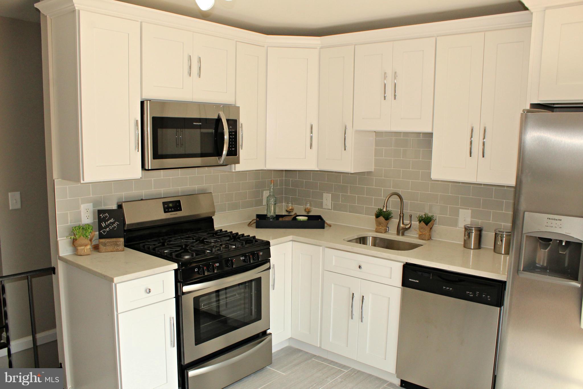 238 Highfalcon Road Reisterstown, MD 21136 - Photo 6 of 21 New kitchen with quartz and stainless steel!