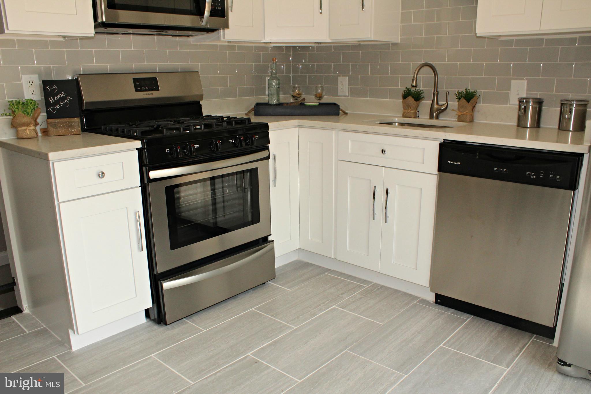238 Highfalcon Road Reisterstown, MD 21136 - Photo 7 of 21 New kitchen with quartz and stainless steel!
