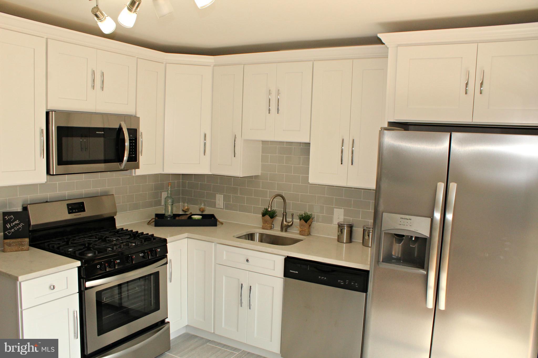 238 Highfalcon Road Reisterstown, MD 21136 - Photo 8 of 21 New kitchen with quartz and stainless steel!