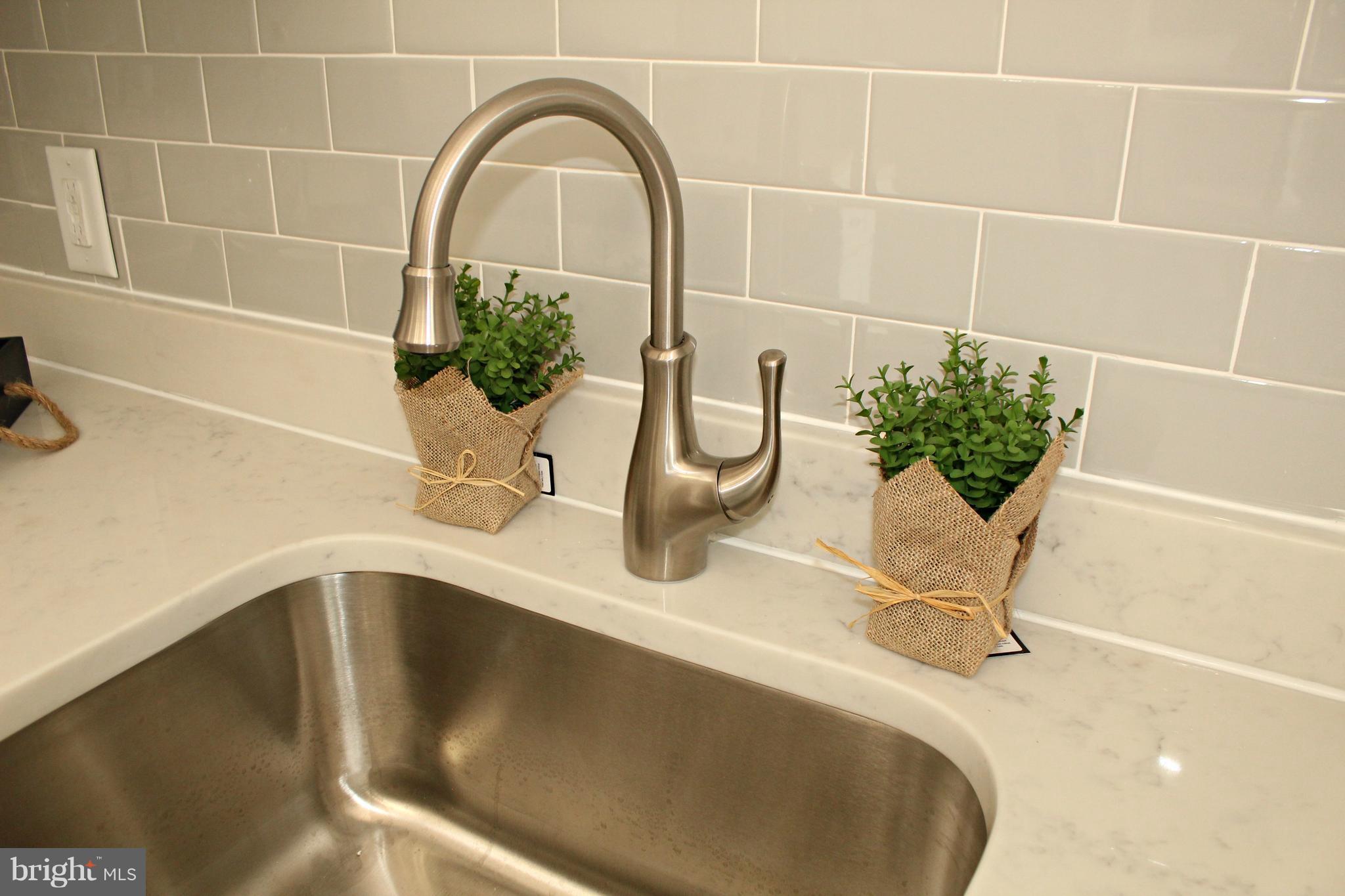 238 Highfalcon Road Reisterstown, MD 21136 - Photo 9 of 21 Quartz counter tops and elegant tile back splash