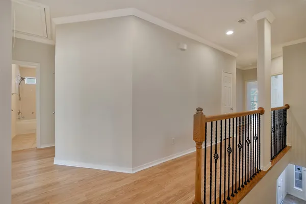 a view of entryway with wooden floor