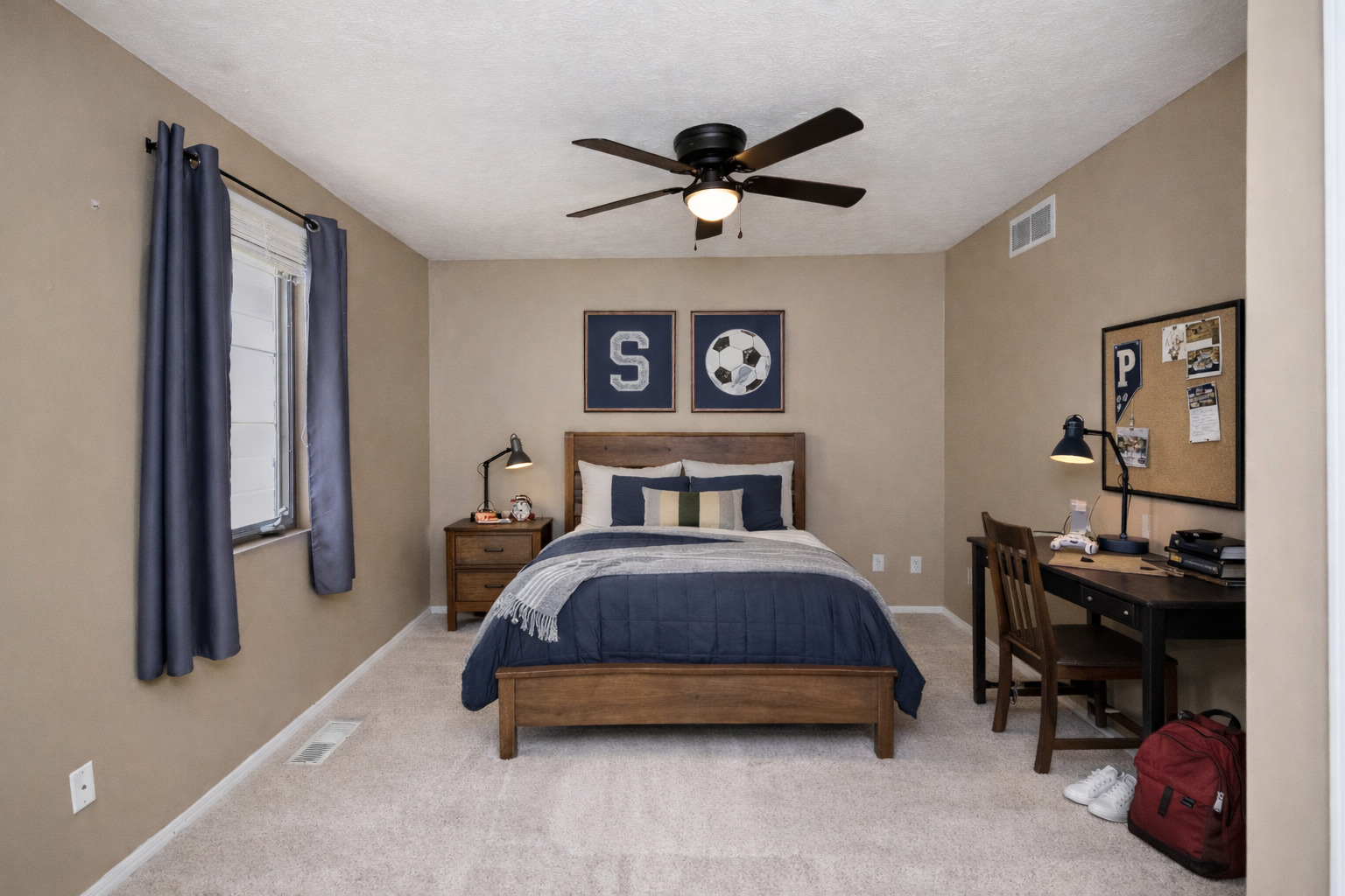 5 Andy Court, Unit 4 Bloomington, IL 61704 - Photo 27 of 52 a bed room with a bed and a chandelier