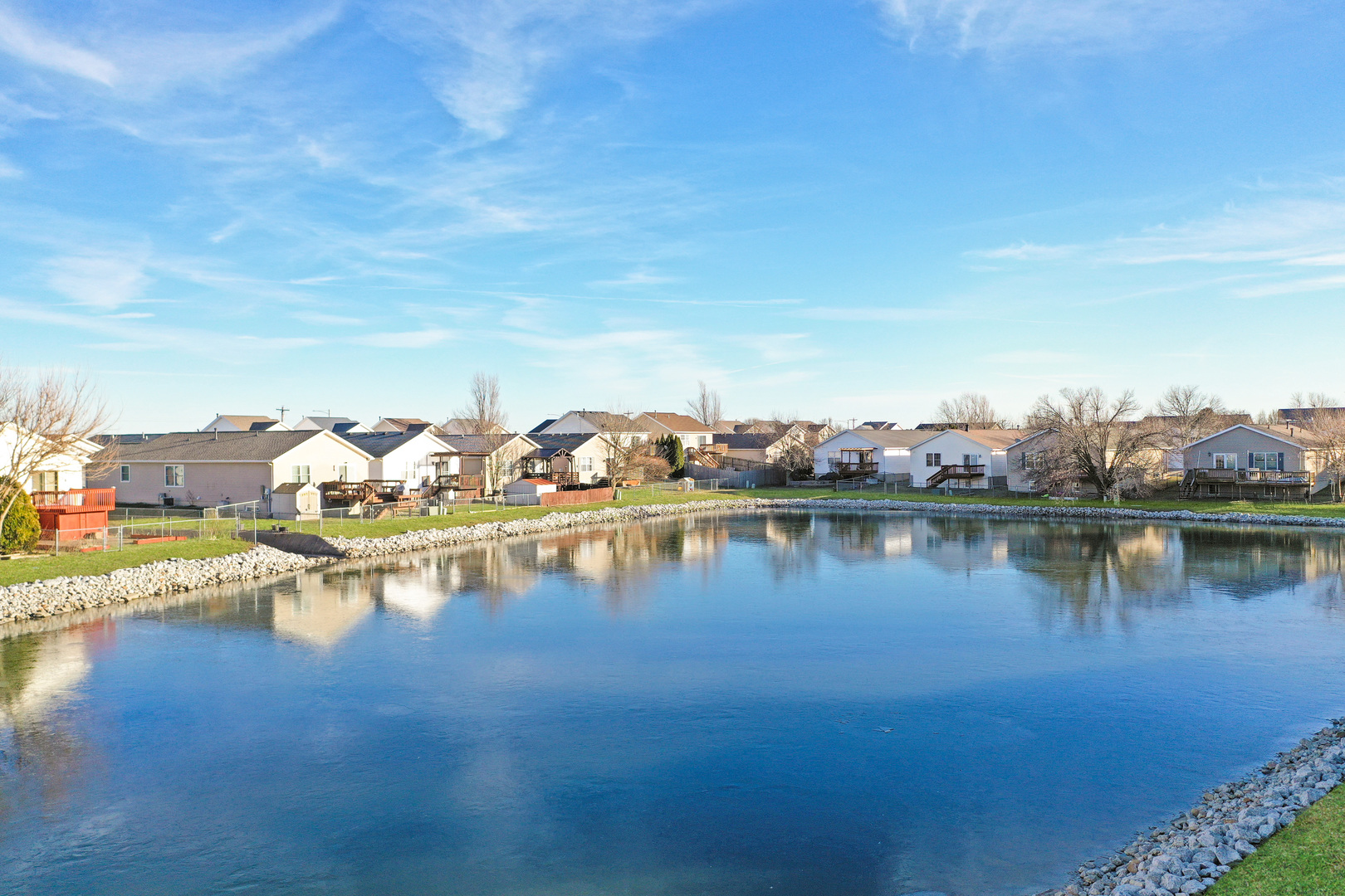 5 Andy Court, Unit 4 Bloomington, IL 61704 - Photo 49 of 52 a view of a lake with house