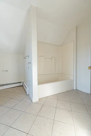 a view of a utility room with closet