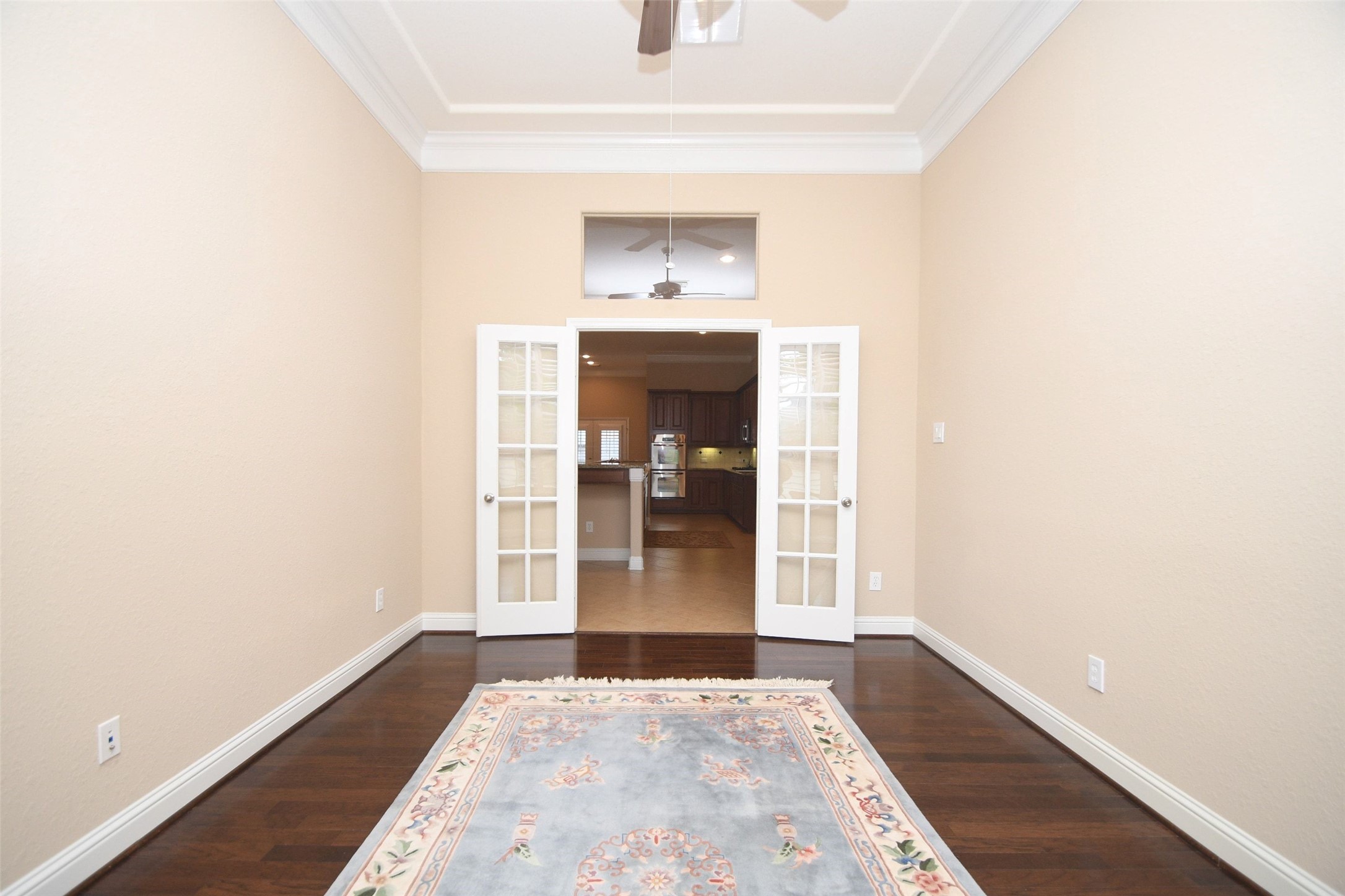5803 Oakdale Meadows Spring, TX 77379 - Photo 7 of 21 a view of a hallway with wooden floor and a living room