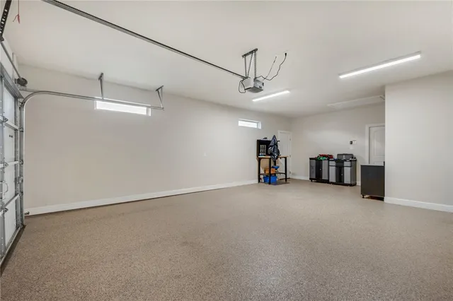 a view of a livingroom with furniture and a ceiling fan