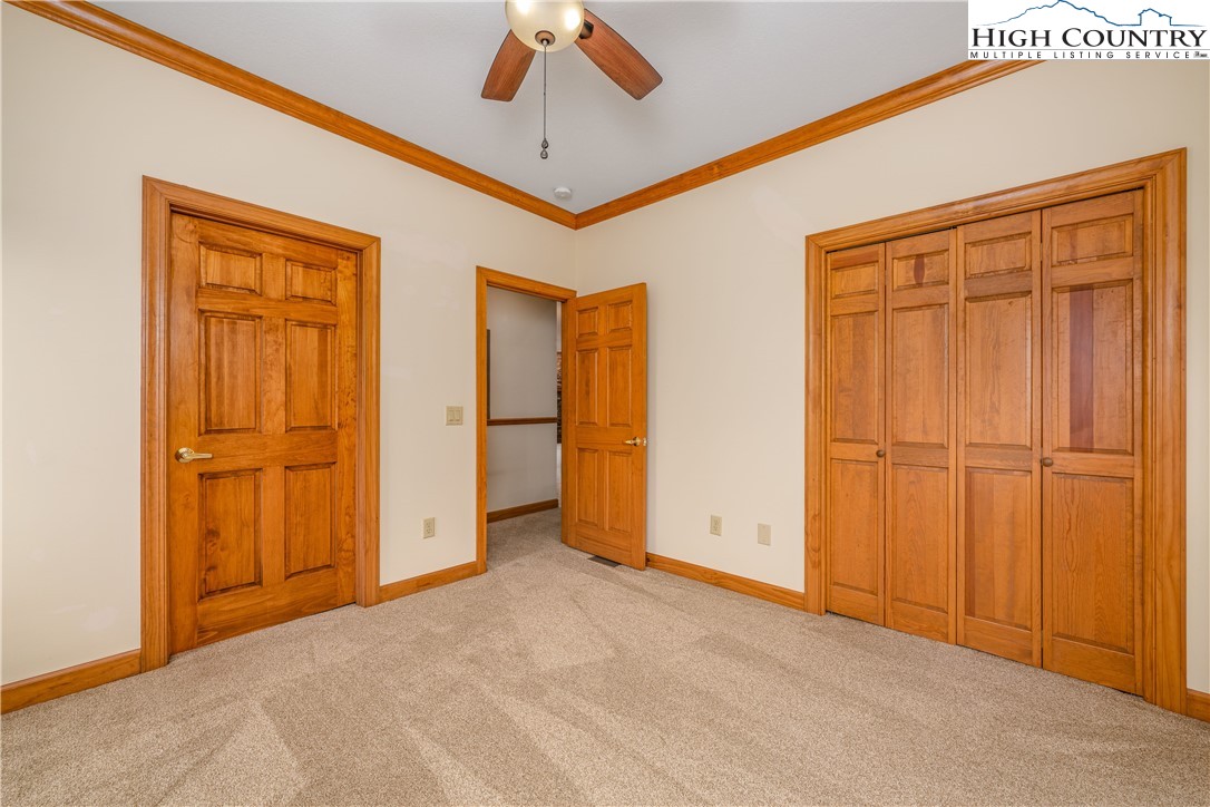 299 Trails End Extension, Unit 37C Sugar Mountain, NC 28604 - Photo 17 of 38 an empty room with closet area