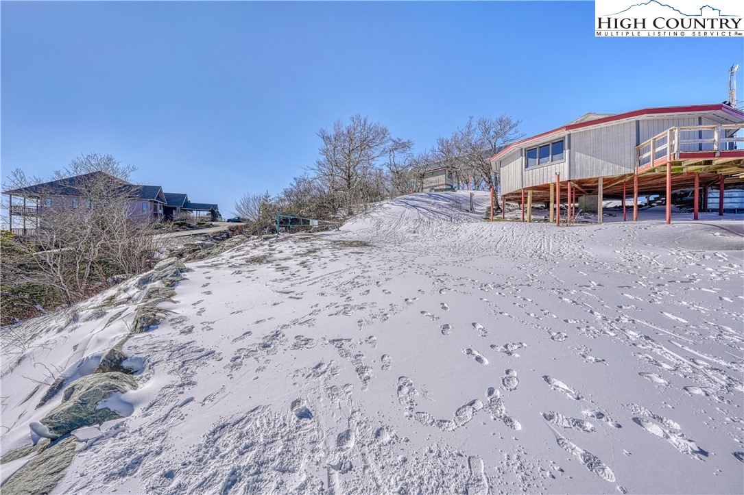 299 Trails End Extension, Unit 37C Sugar Mountain, NC 28604 - Photo 24 of 38 a view of a swimming pool with furniture