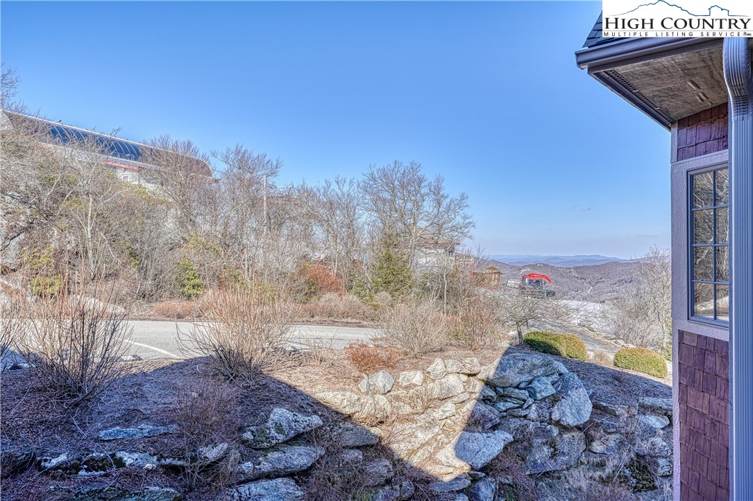 299 Trails End Extension, Unit 37C Sugar Mountain, NC 28604 - Photo 26 of 38 a view of a yard with wooden fence