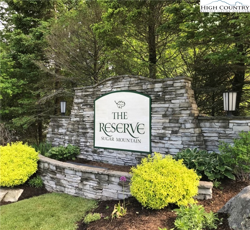 299 Trails End Extension, Unit 37C Sugar Mountain, NC 28604 - Photo 29 of 38 a sign that is on a brick wall