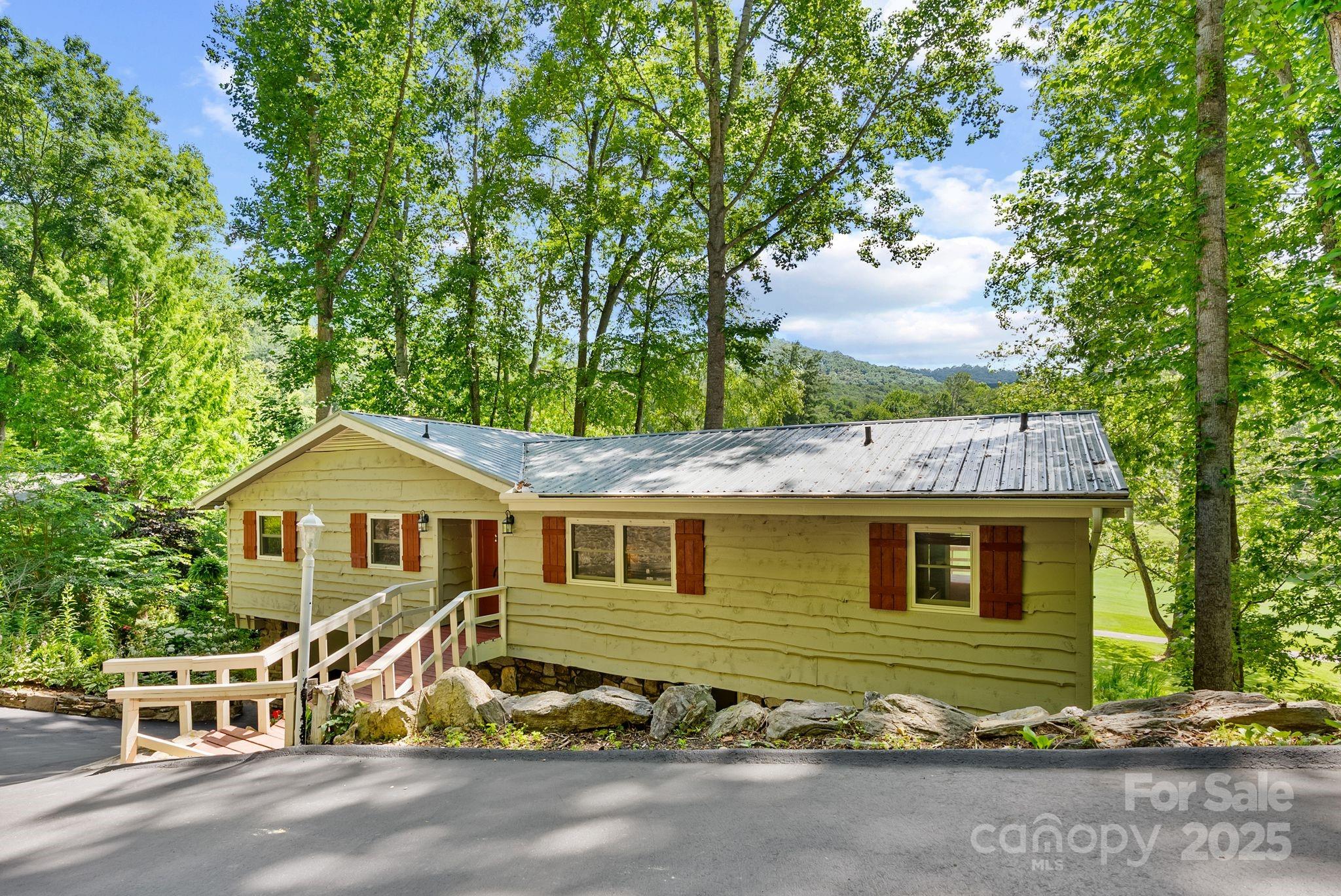 386 Country Club Drive Canton, NC 28716 - Photo 2 of 47 a view of front a house with a yard