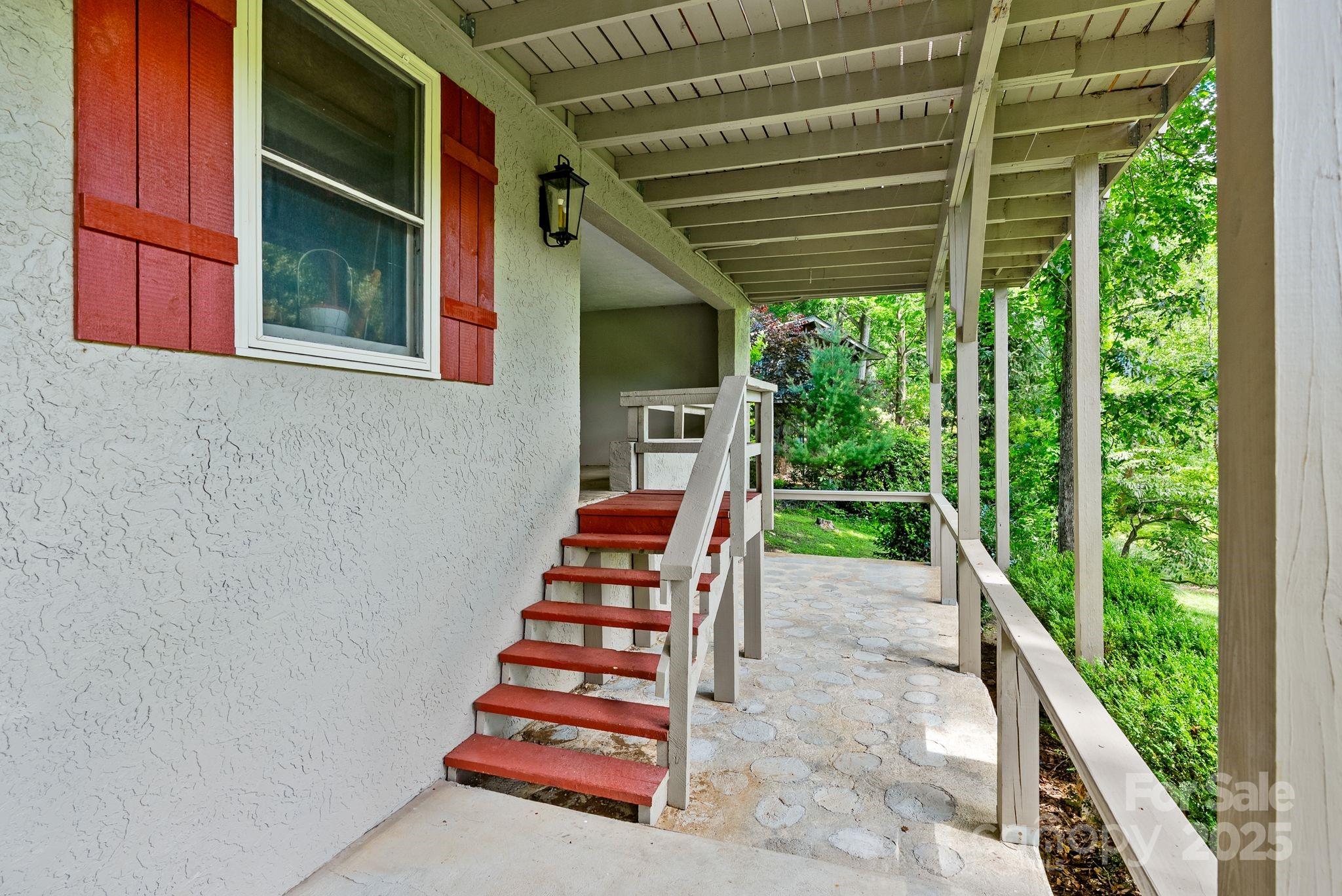 386 Country Club Drive Canton, NC 28716 - Photo 38 of 47 a balcony view with a backyard space
