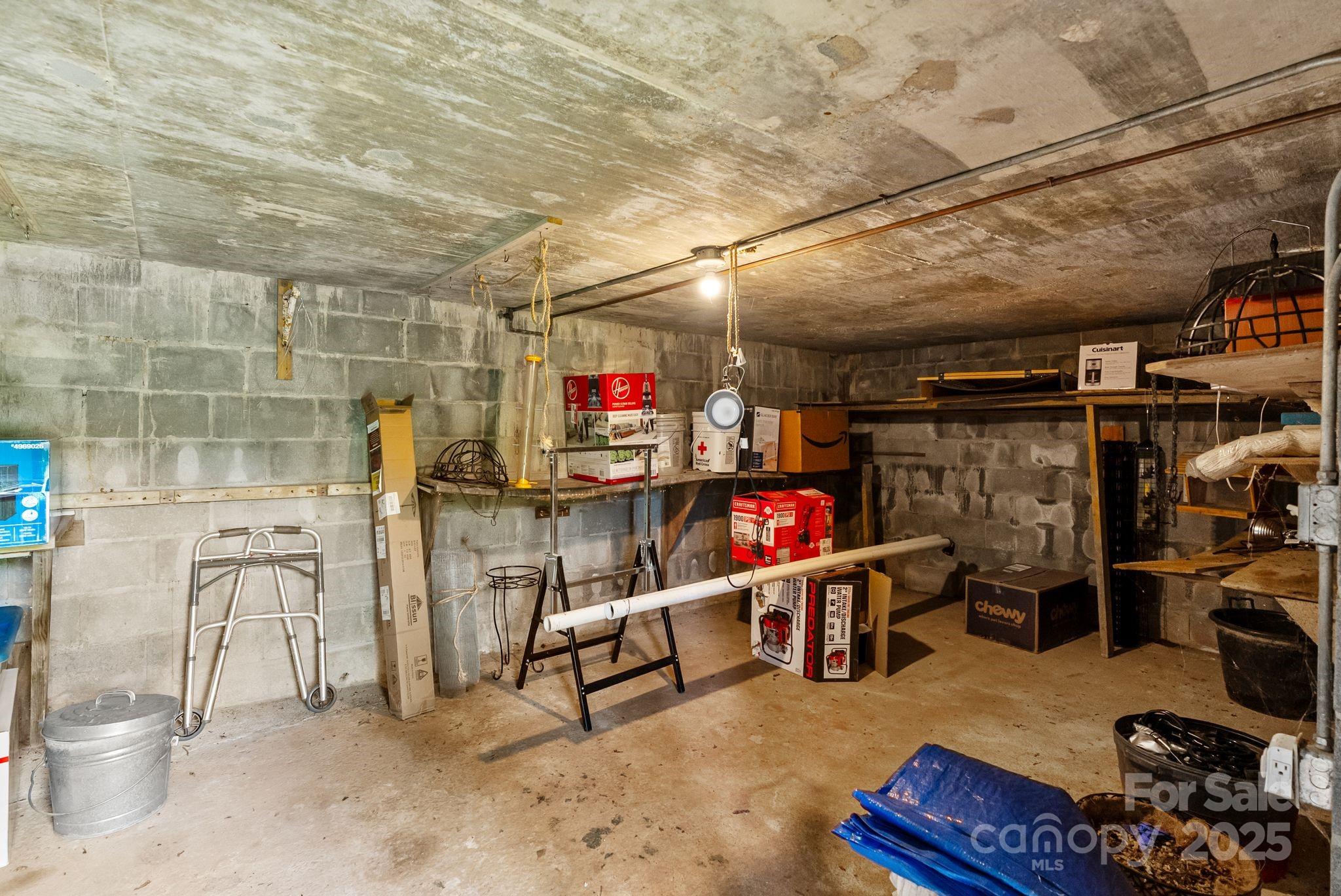 386 Country Club Drive Canton, NC 28716 - Photo 41 of 47 a room with lots of storage and furniture