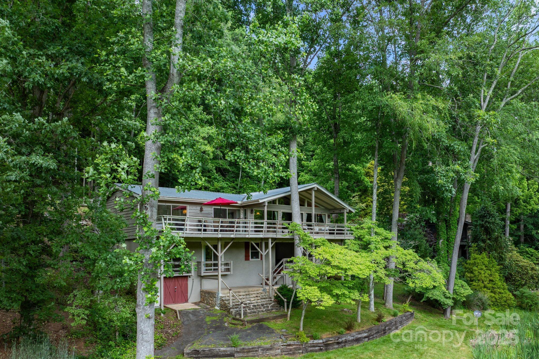 386 Country Club Drive Canton, NC 28716 - Photo 46 of 47 a view of house with balcony and garden