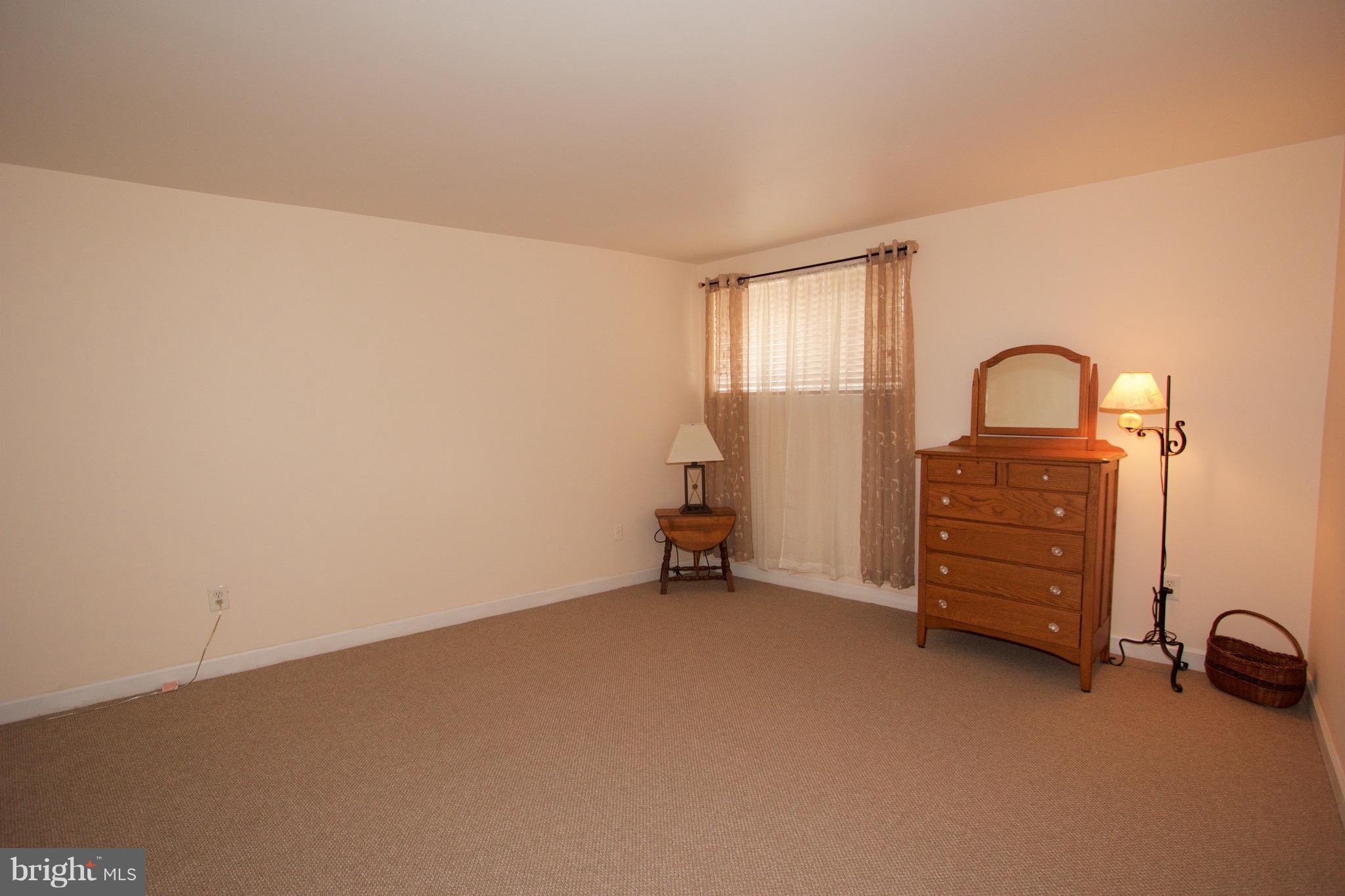 2507 Baltimore Road, Unit 1 Rockville, MD 20853 - Photo 18 of 30 an empty room with windows