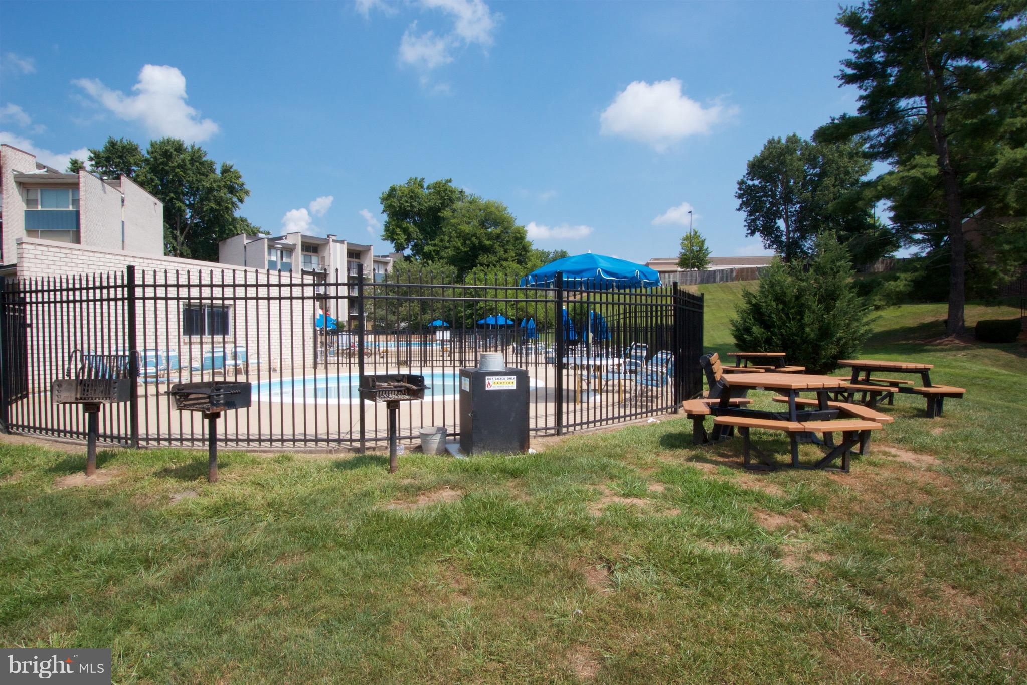 2507 Baltimore Road, Unit 1 Rockville, MD 20853 - Photo 27 of 30 a view of a park with a bench