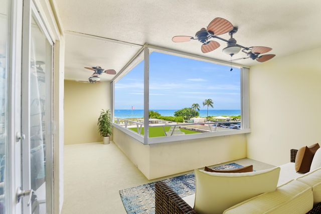 a view of a swimming pool with a garden