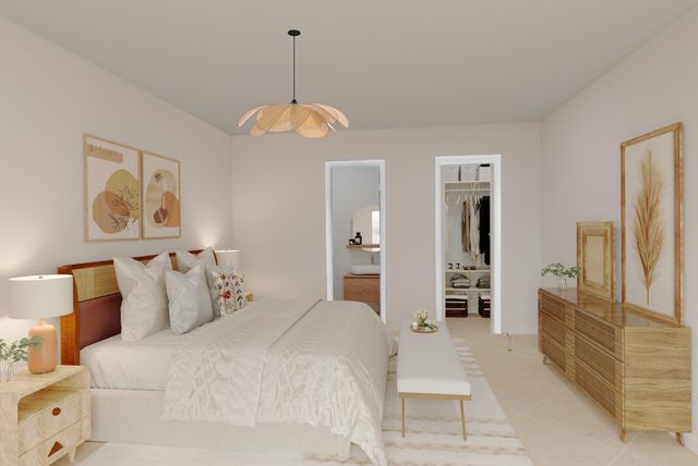 a bedroom with a bed and a cabinets