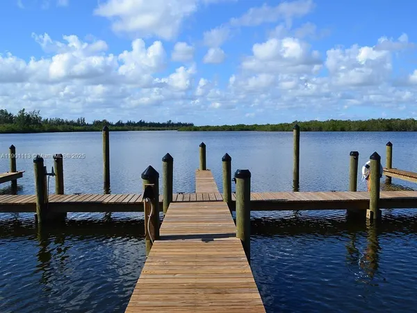a front view of a house with lake view