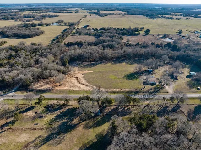 a view of a backyard of a house