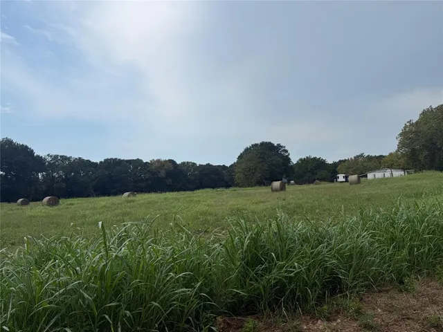 a view of an outdoor and a yard