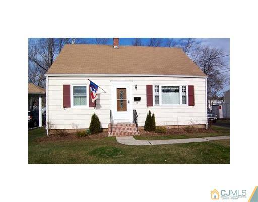 38 Lancaster Road Colonia, NJ 07067 - Photo 1 of 14 a upper view of a house with a yard