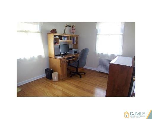 38 Lancaster Road Colonia, NJ 07067 - Photo 8 of 14 a workspace with furniture and window
