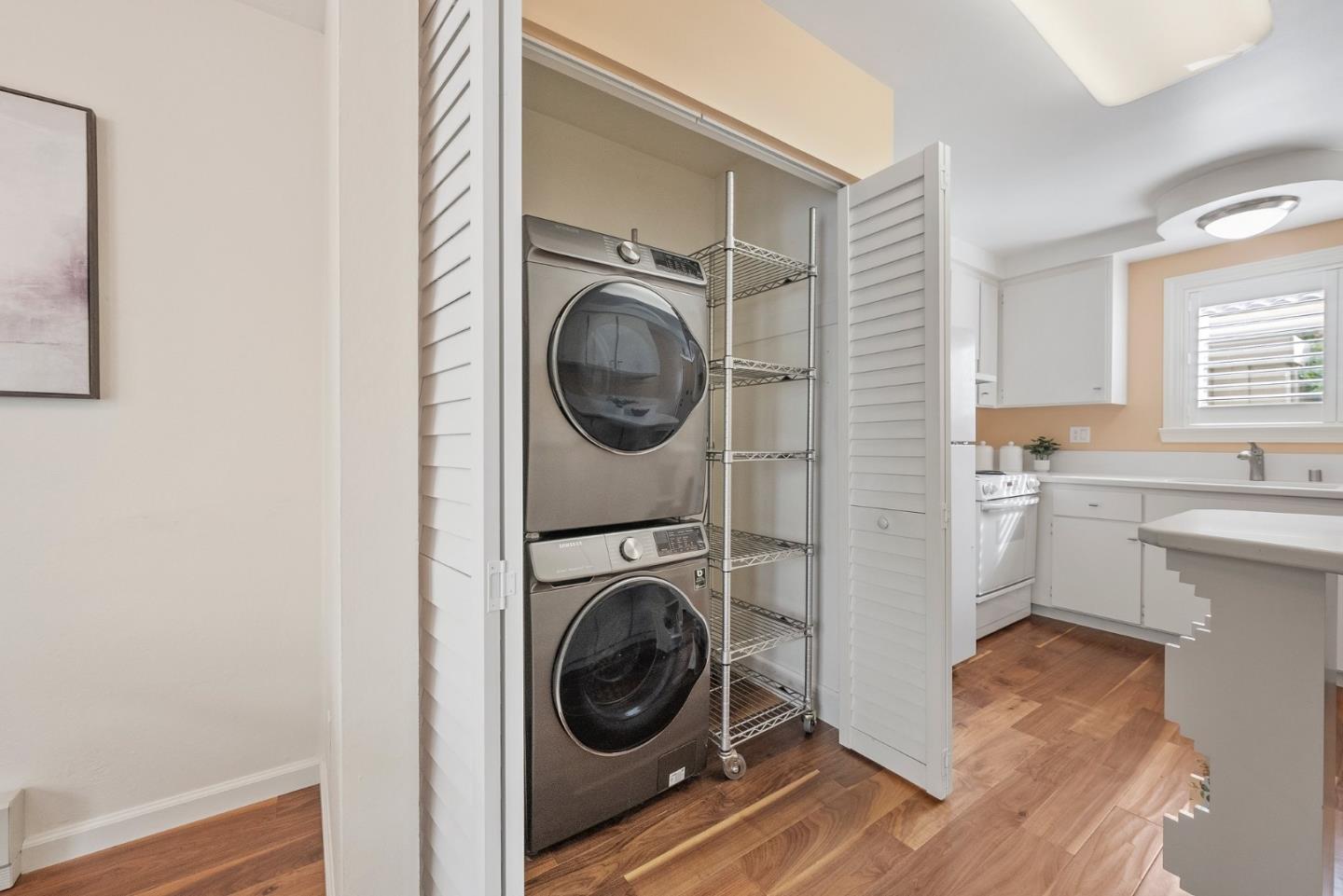 4017 Gold Run Way San Jose, CA 95136 - Photo 11 of 25 a view of a hallway with washer and dryer