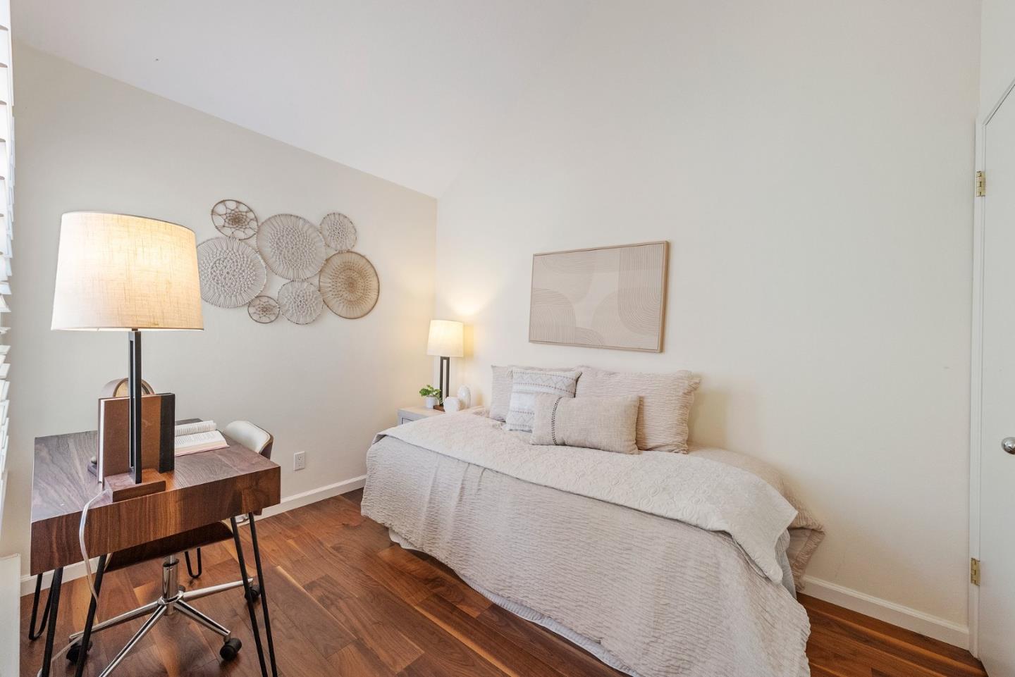 4017 Gold Run Way San Jose, CA 95136 - Photo 16 of 25 a bedroom with a bed and a lamp on table