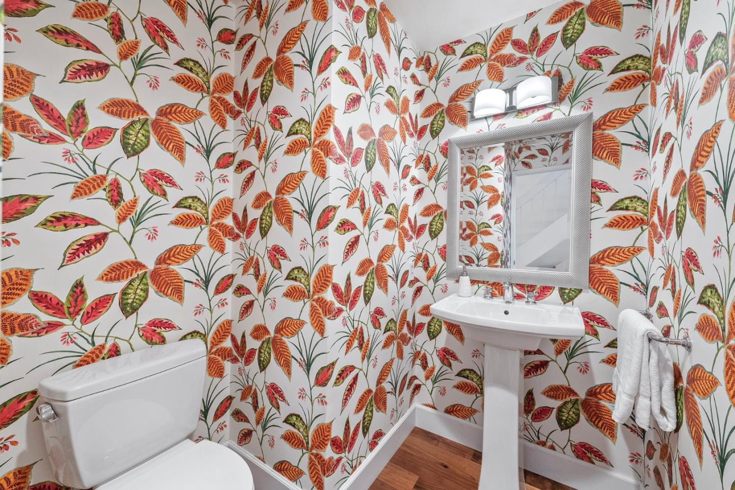 4017 Gold Run Way San Jose, CA 95136 - Photo 19 of 25 a white toilet sitting next to a shower curtain