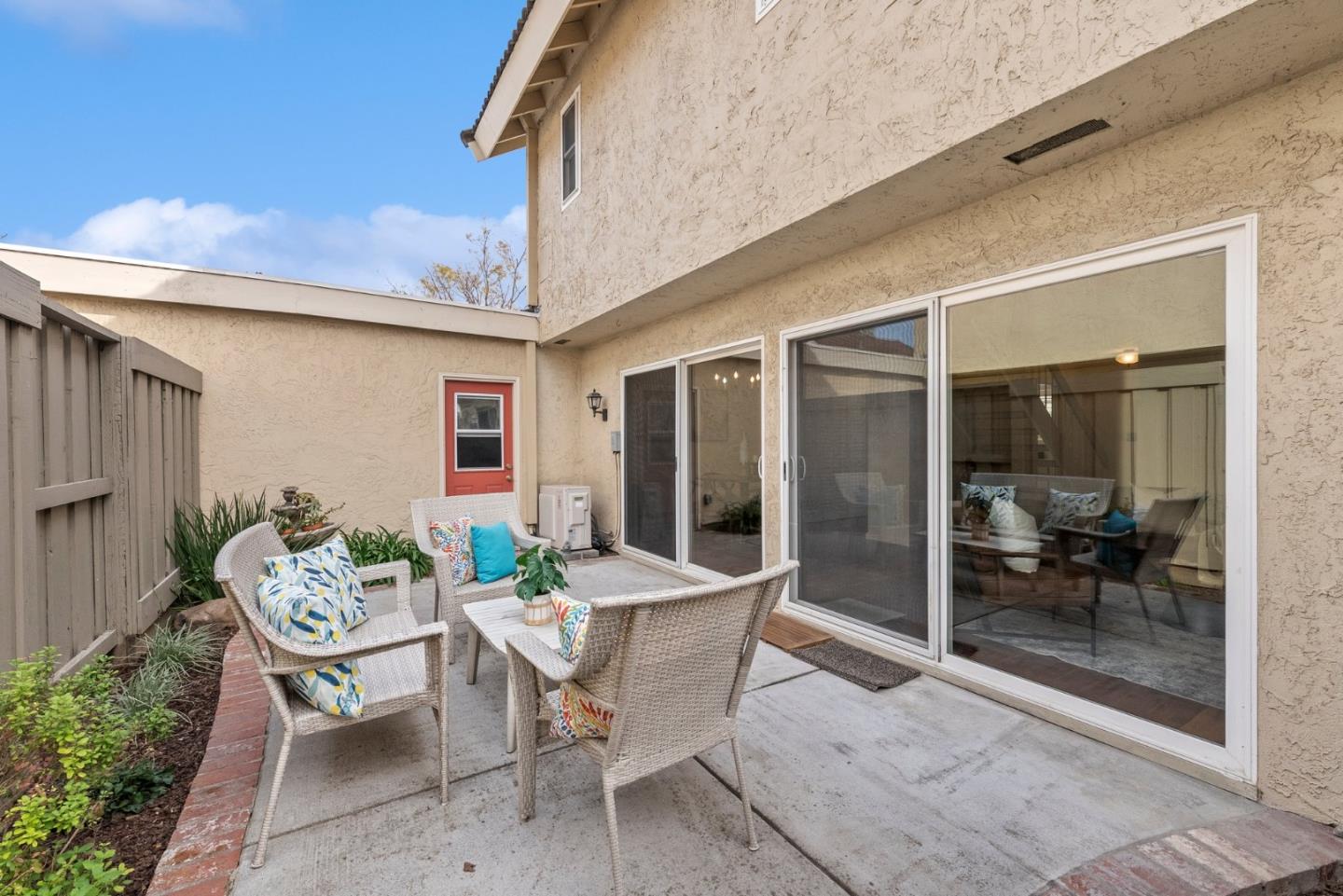 4017 Gold Run Way San Jose, CA 95136 - Photo 21 of 25 a patio with a table and chairs and potted plants