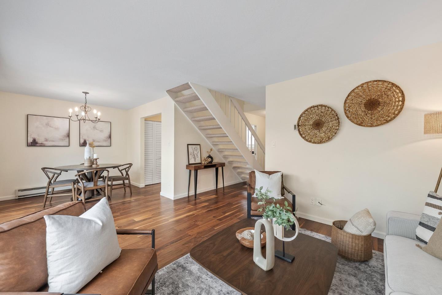 4017 Gold Run Way San Jose, CA 95136 - Photo 6 of 25 a living room with furniture a dining table and a chandelier
