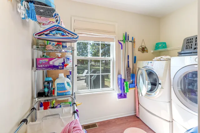 a utility room with dryer and washer