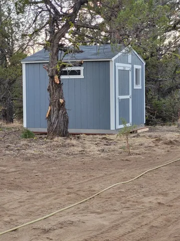 a view of a yard with an outdoor space