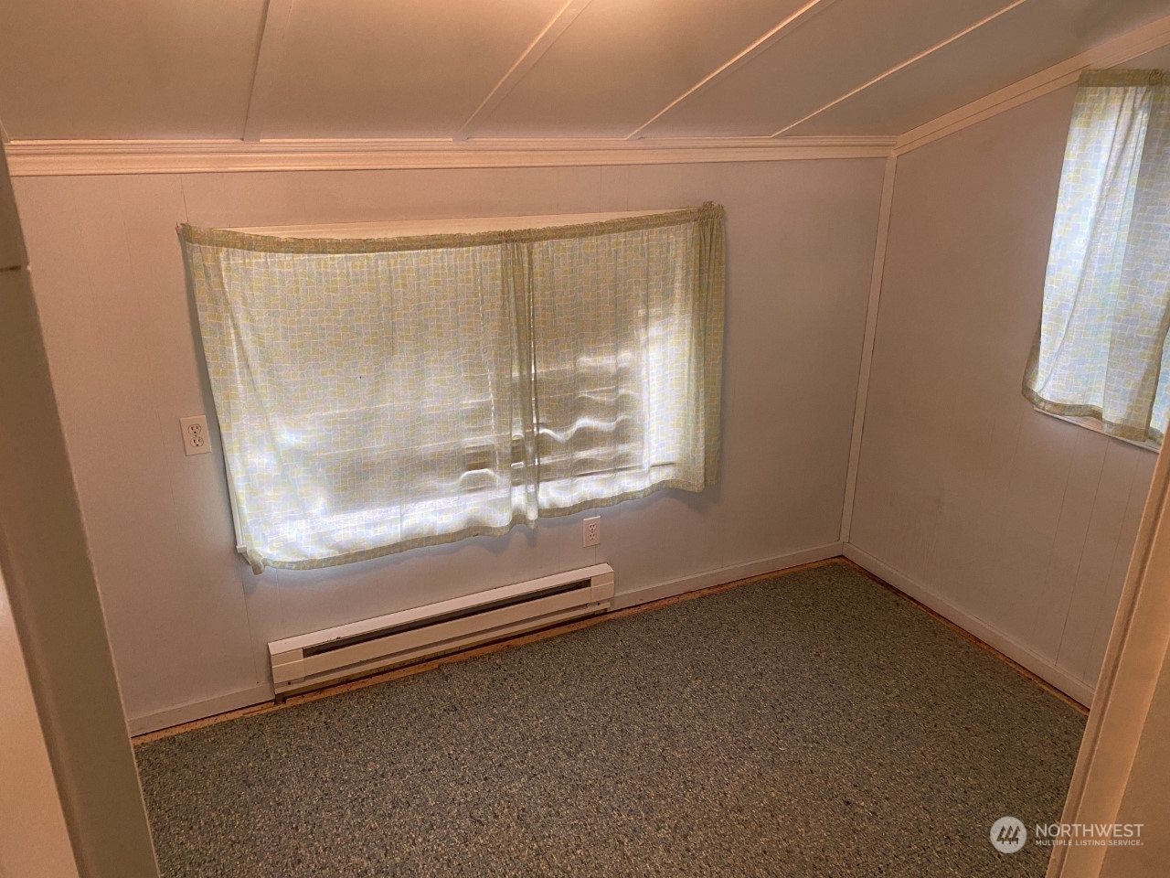 22604 Yeager Road Monroe, WA 98272 - Photo 16 of 21 a view of a room with wooden floor and windows