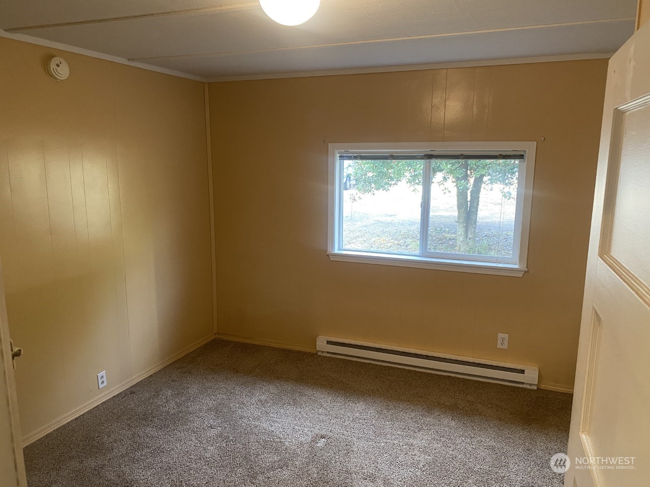 22604 Yeager Road Monroe, WA 98272 - Photo 17 of 21 an empty room with a window