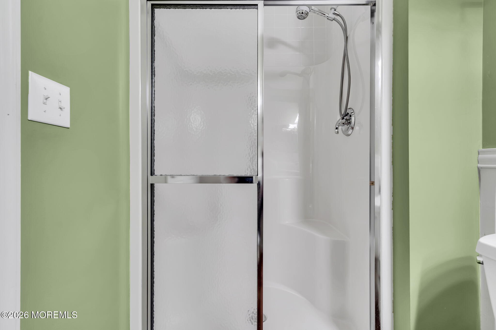 10 Congressional Road Jackson, NJ 08527 - Photo 48 of 72 a bathroom with a glass shower door