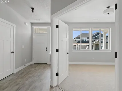 a view of empty room with windows