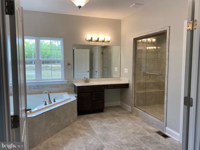 Calverts Run La Plata, MD 20646 - Photo 8 of 12 Owners Suite bath with deluxe shower, soak in tub