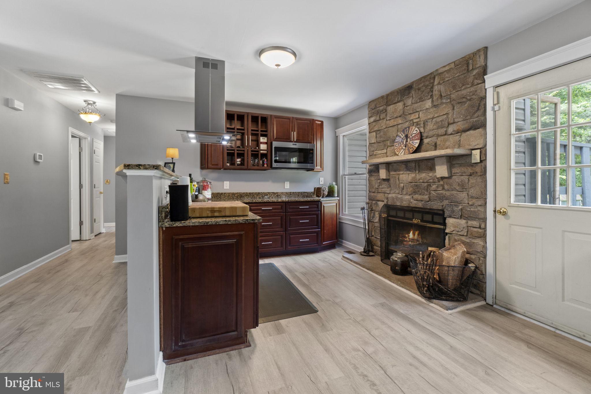 3508 Winding Road Partlow, VA 22534 - Photo 6 of 38 Stunning kitchen with full stone fireplace!