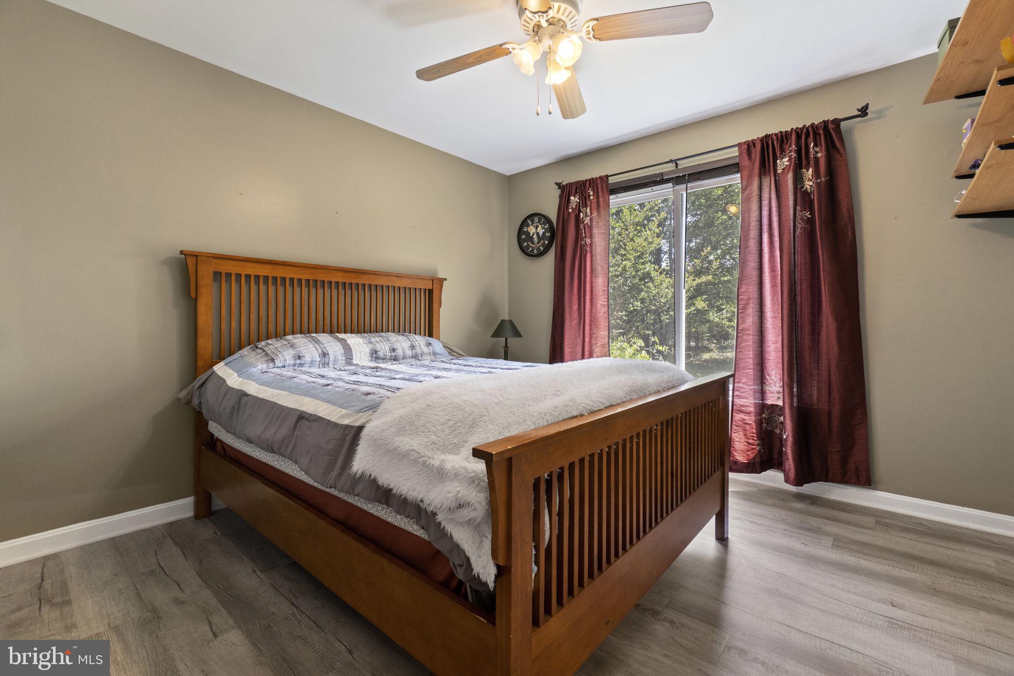 3508 Winding Road Partlow, VA 22534 - Photo 9 of 38 Bedroom 1 w/ Luxury Vinyl Plank Flooring & Fan!